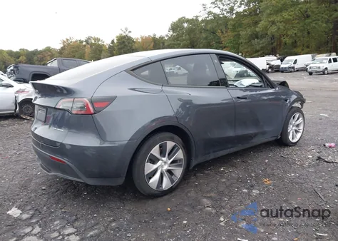2023 Tesla Model Y Awd/Long Range Dual Motor All-Wheel Drive z USA, uszkodzony, nr VIN 7SAYGAEE6PF600769